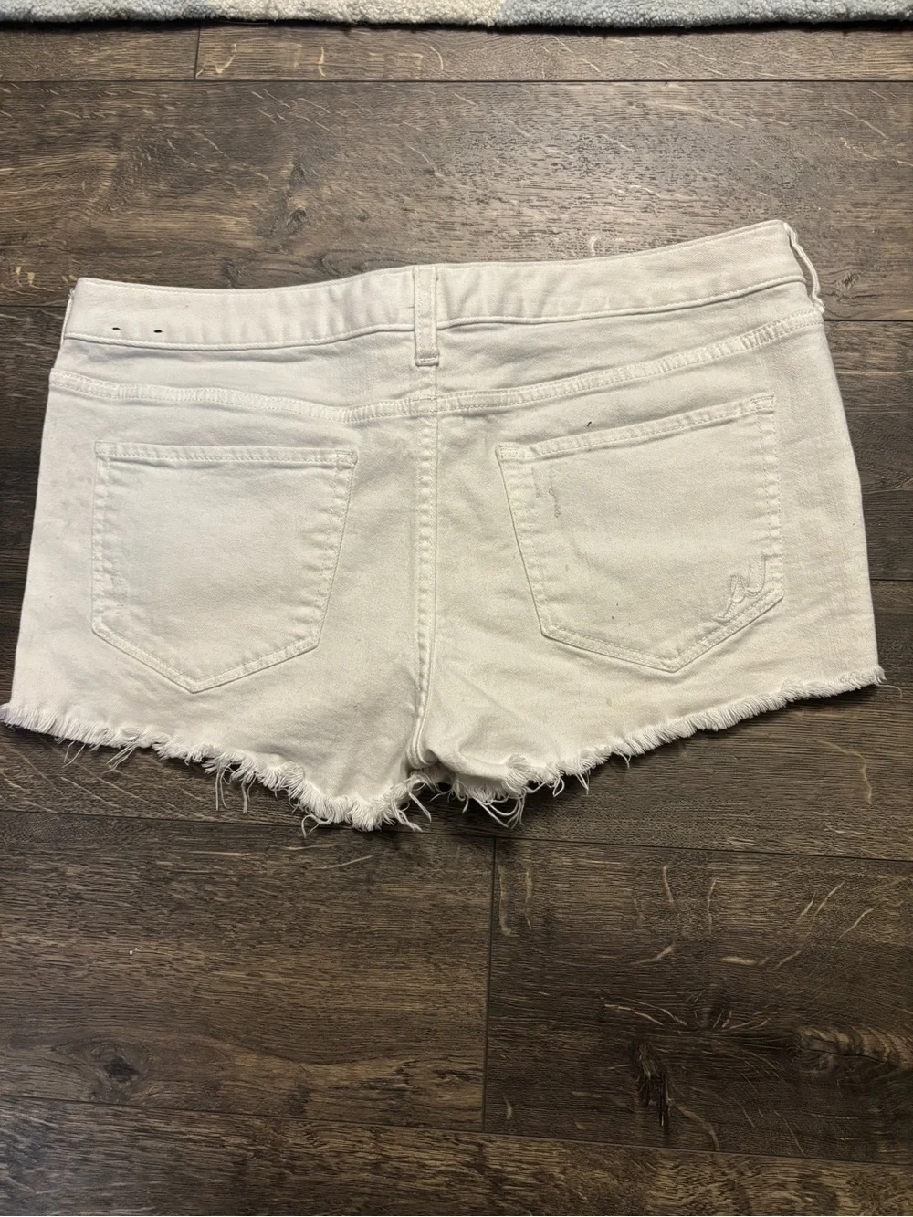 Express white distressed shorts